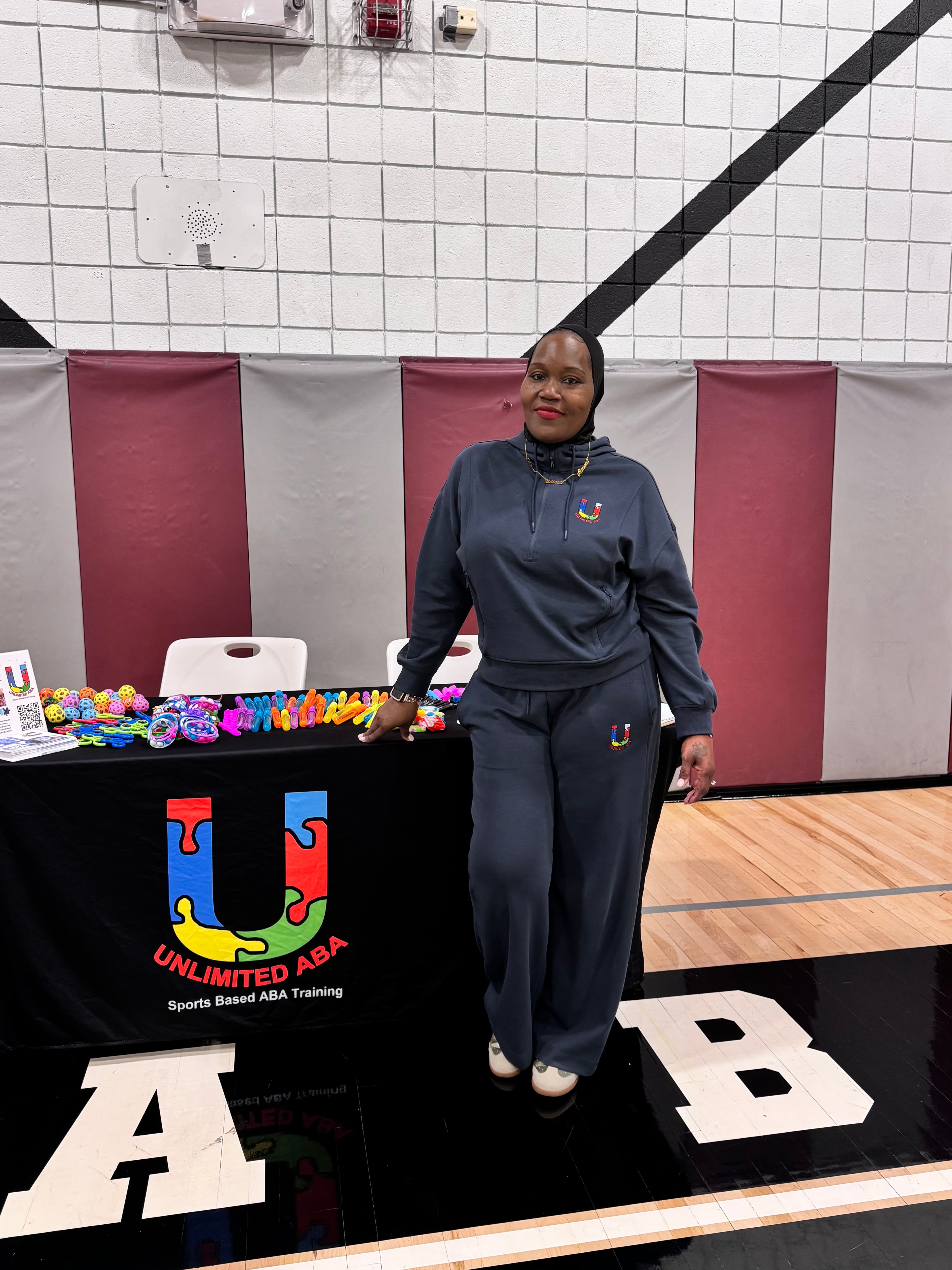 Basim Hudeen in professional attire at an ABA event
