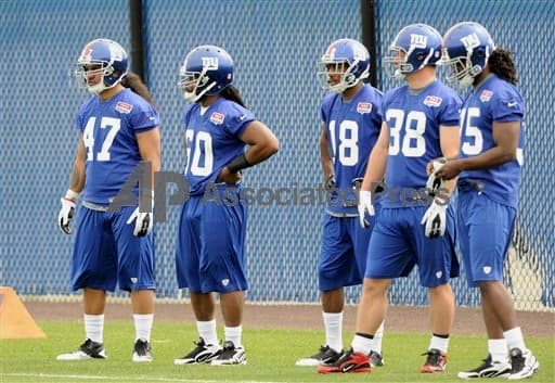Basim Hudeen with Giants teammates