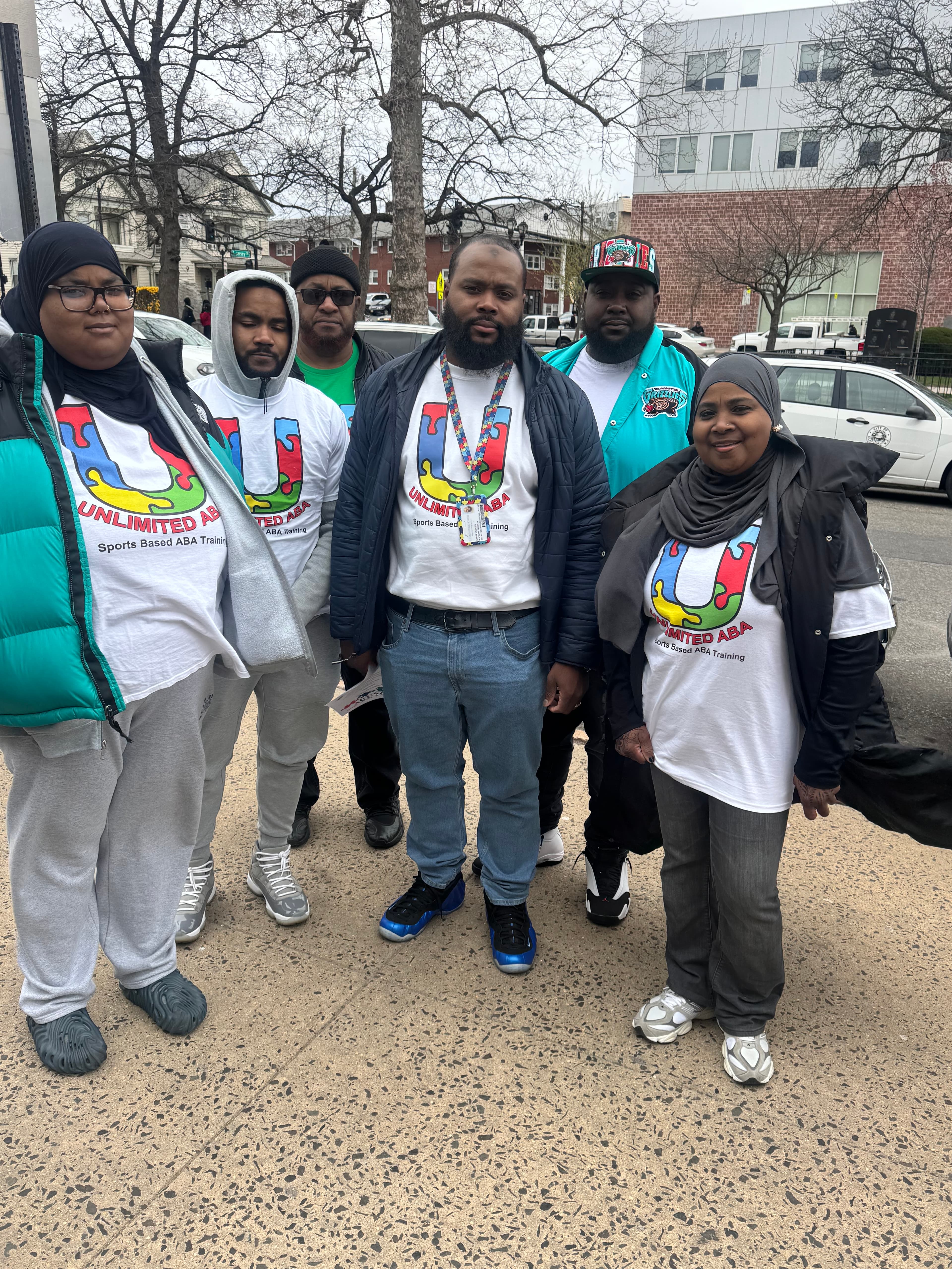 Unlimited ABA Sports team members outdoors in branded gear